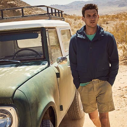 guy standing next to 4wd